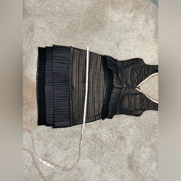 BCBG black dress in size Medium. Place offer I will defently consider Thanks. - Picture 10 of 10
